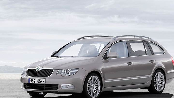 Skoda Superb Combi In Grey Near Mountains N Sea
